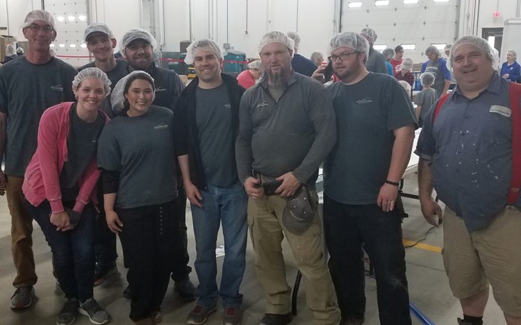 Grand Forks Team Members Help Feed My Starving Children Pack 4K Meals